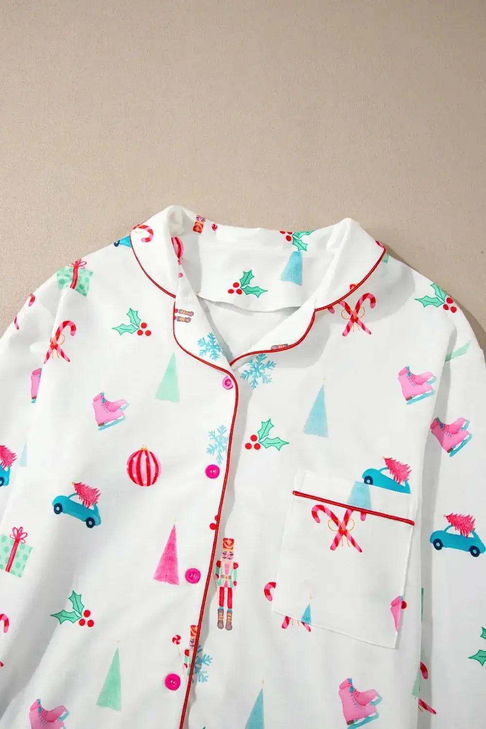 Women’s Christmas print long sleeve collared pajama lounge set by Trendsi, featuring festive holiday pattern and comfortable fabric.