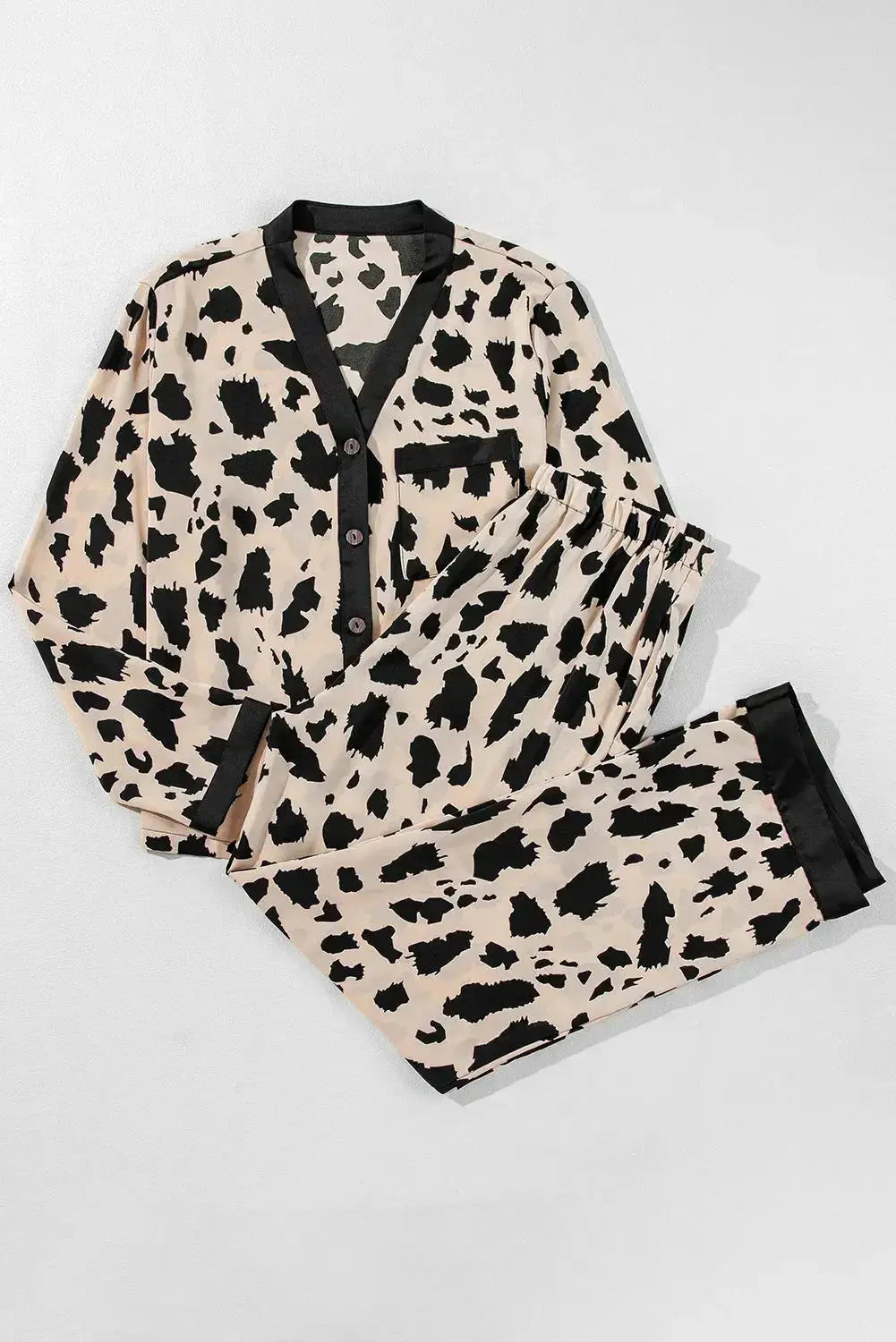 Women's long sleeve button-down pajama set by Plush Fashion Hub, soft lounge wear with classic design and comfortable fit.