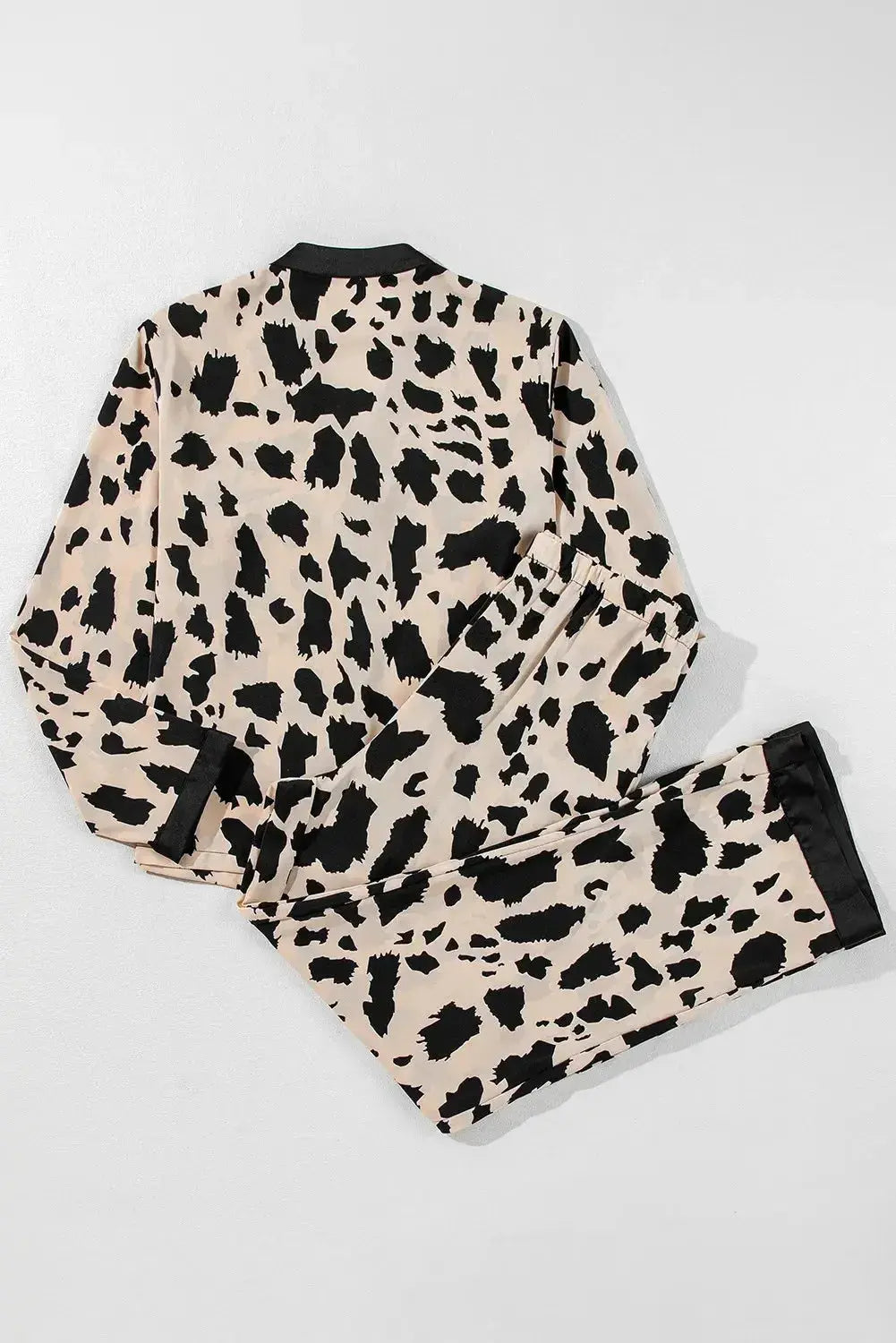 Women's plush fashion hub long sleeve button-down pajama set, soft lounge wear with classic design and comfortable fit.