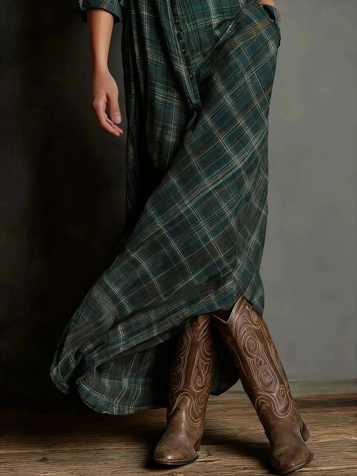 Women's classic plaid maxi dress with button-down front and pockets, by Trendsi, featuring a stylish and comfortable design.