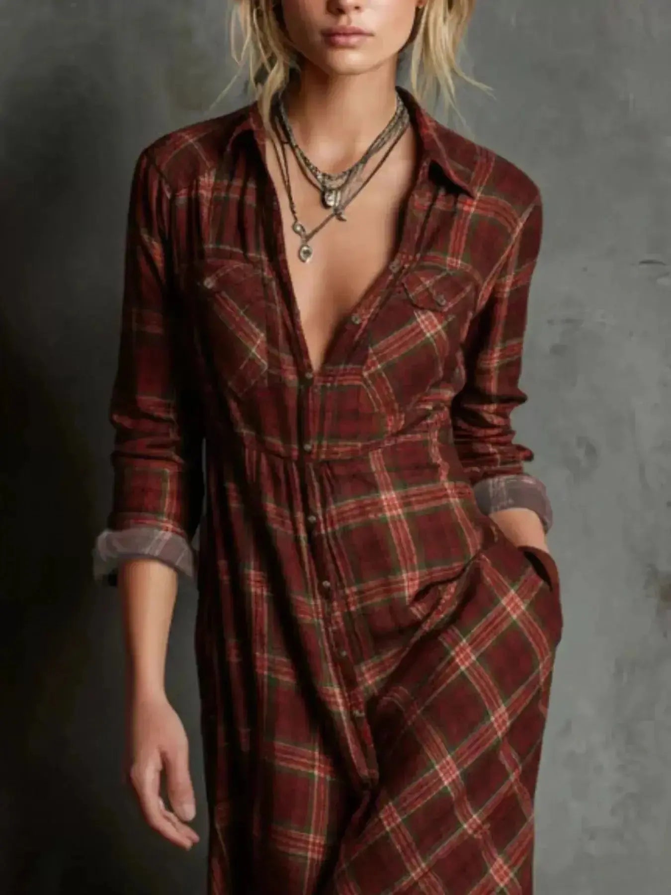 Women's classic plaid button-down maxi dress with pockets by Trendsi, featuring a relaxed fit and timeless plaid pattern.