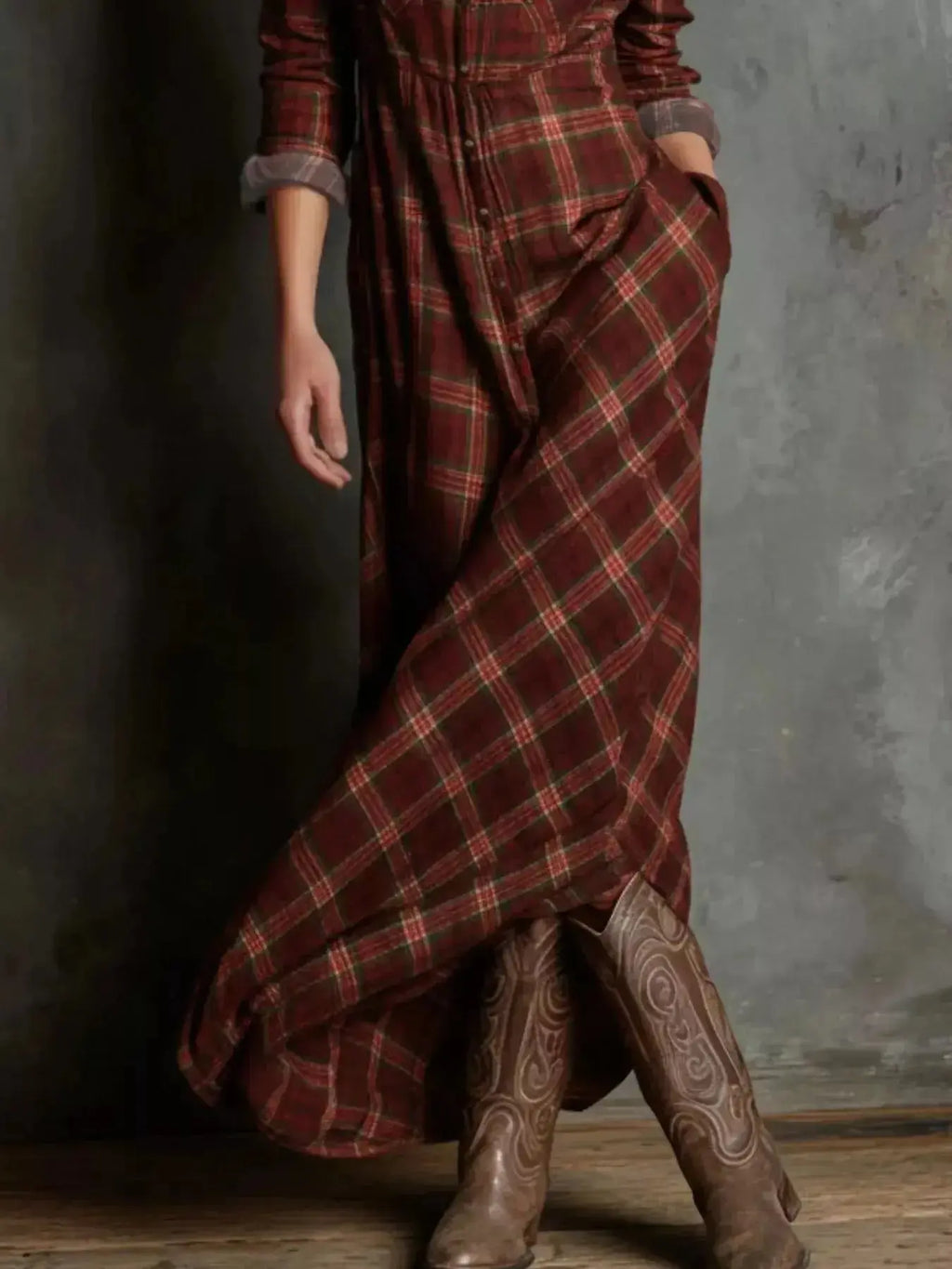 Women's classic plaid button-down maxi dress with pockets by Trendsi, featuring a relaxed fit and stylish design.