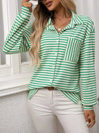 Women's classic striped long sleeve button-up shirt by Trendsi, perfect for versatile office wear, featuring a stylish, timeless design.