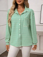Women's classic striped long sleeve button-up shirt by Trendsi, perfect for versatile office wear, featuring a timeless design.