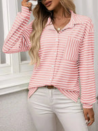 Women’s classic striped long sleeve button-up shirt by Trendsi, perfect for versatile office wear and professional looks.