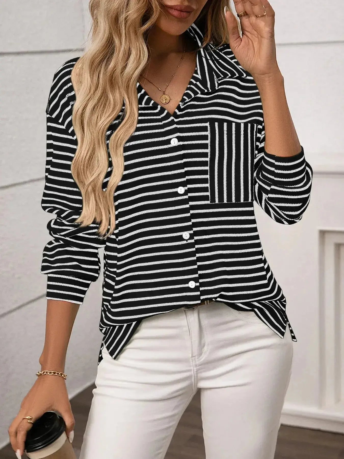 Women’s classic striped long sleeve button-up shirt by Trendsi, versatile for office wear, featuring a timeless design and stylish fit.