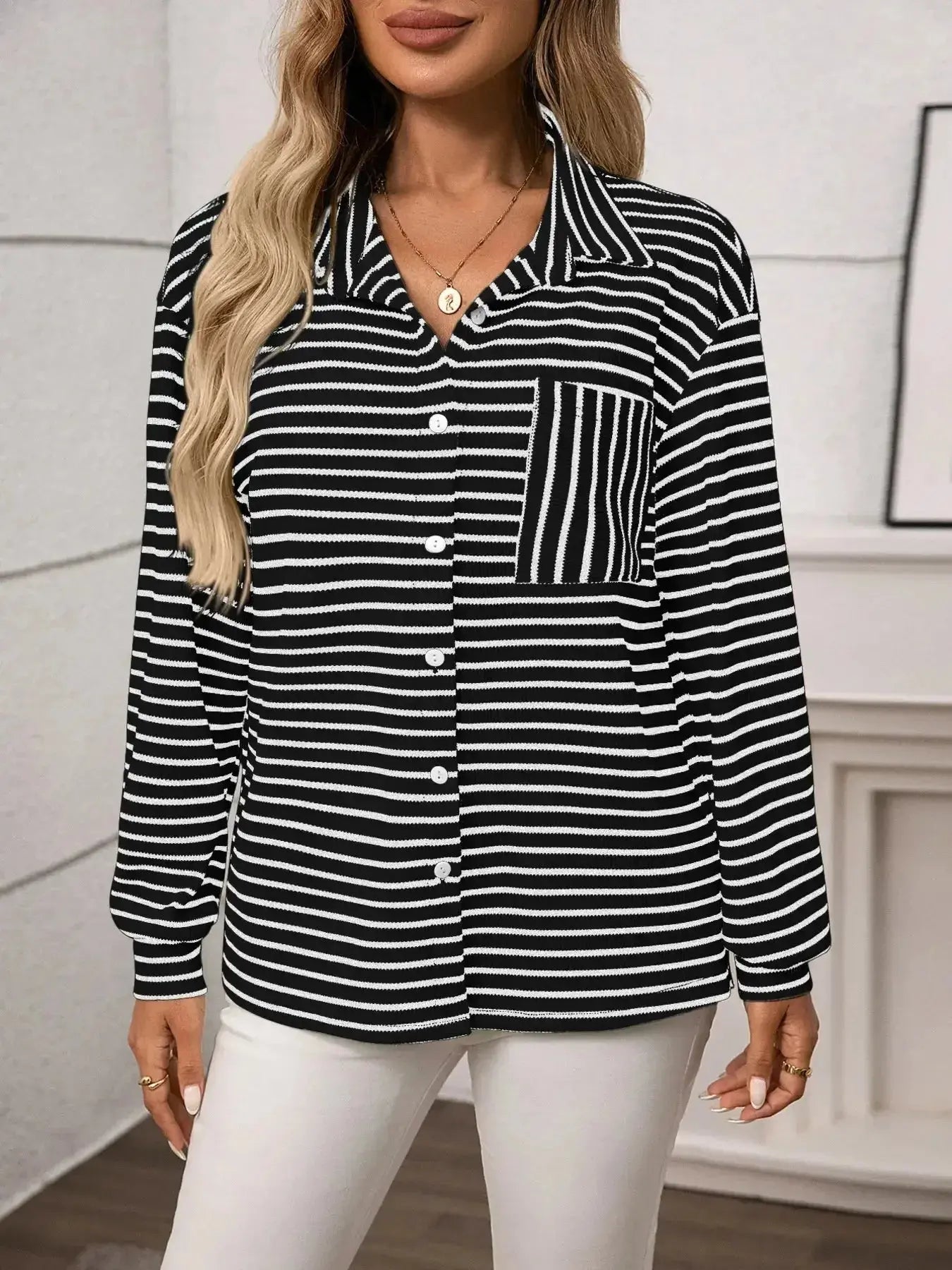 Women's classic striped long sleeve button-up shirt by Trendsi, ideal for versatile office wear, featuring a stylish and timeless design.