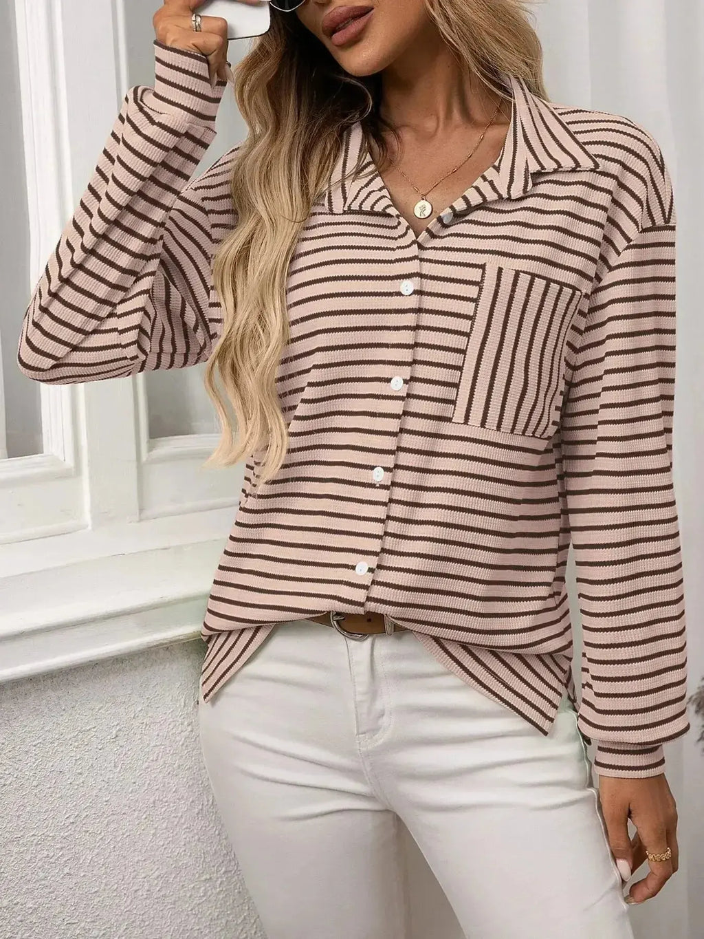 Women’s classic striped long sleeve button-up shirt by Trendsi, perfect for versatile office wear, with a tailored fit and collar.