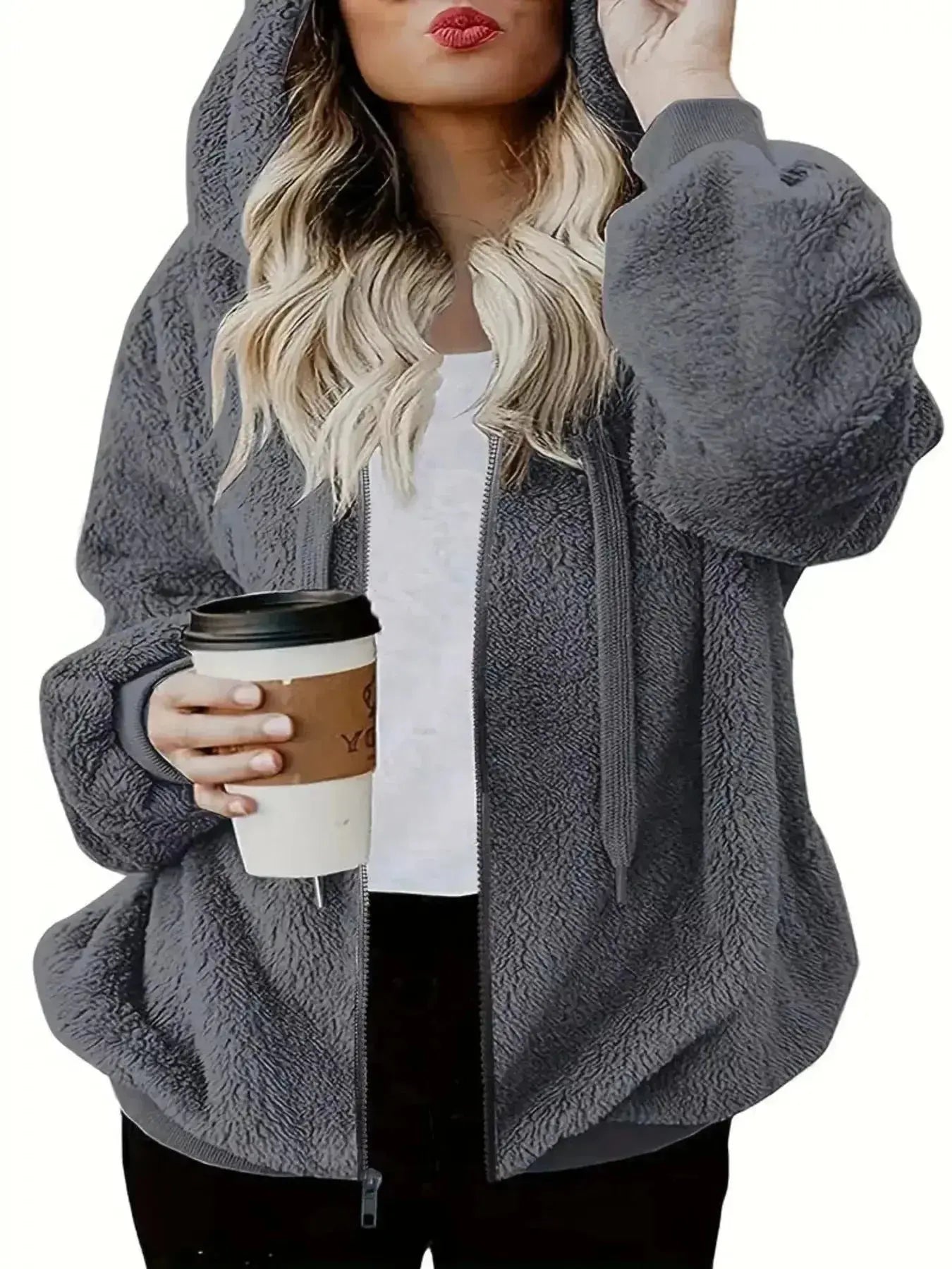 Women’s cozy fleece zip-up hoodie with drawstring, soft plush fabric, from Trendsi, perfect for casual wear and layering.