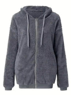 Women’s cozy fleece zip-up hoodie with drawstring from Trendsi, featuring a plush sweater design and comfortable fit.