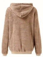 Women’s cozy fleece zip-up hoodie with drawstring, trendy sweater by Trendsi featuring plush fabric and casual style.