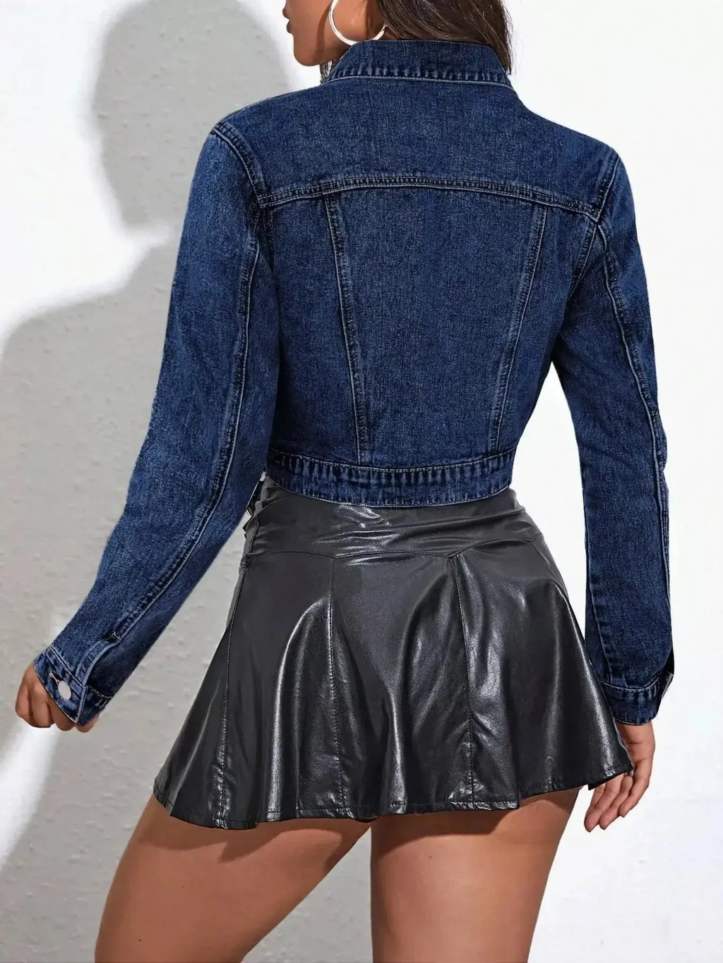 Women’s cropped denim jacket with button-up front, classic cotton blend fabric, stylish jean jacket by Trendsi.