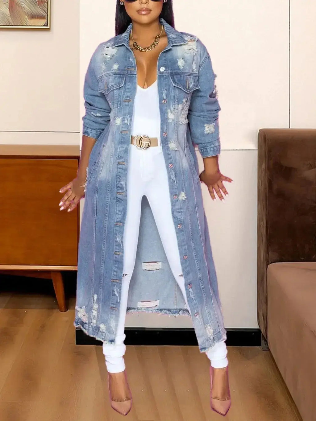 Women’s distressed raw hem denim jacket with long sleeves, classic cotton jean style, by Trendsi.