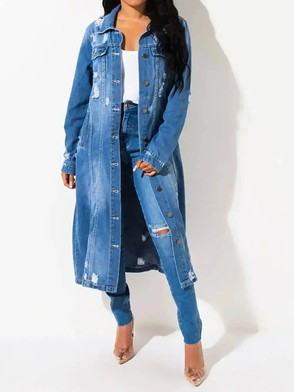 Women's distressed raw hem denim jacket with long sleeves, classic cotton jean style, by Trendsi, shown on a model.