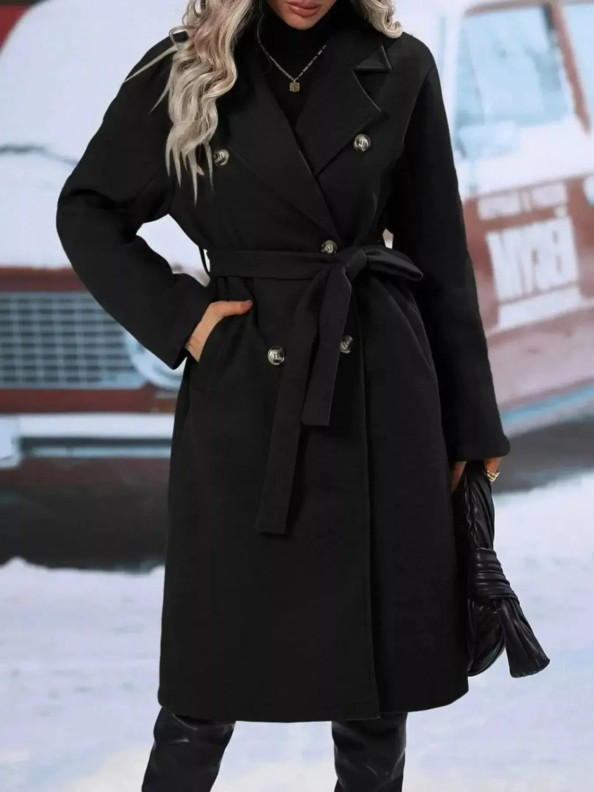Women’s double-breasted trench coat with tie waist belt, stylish outerwear by Plush Fashion Hub, shown hanging with a neutral background.