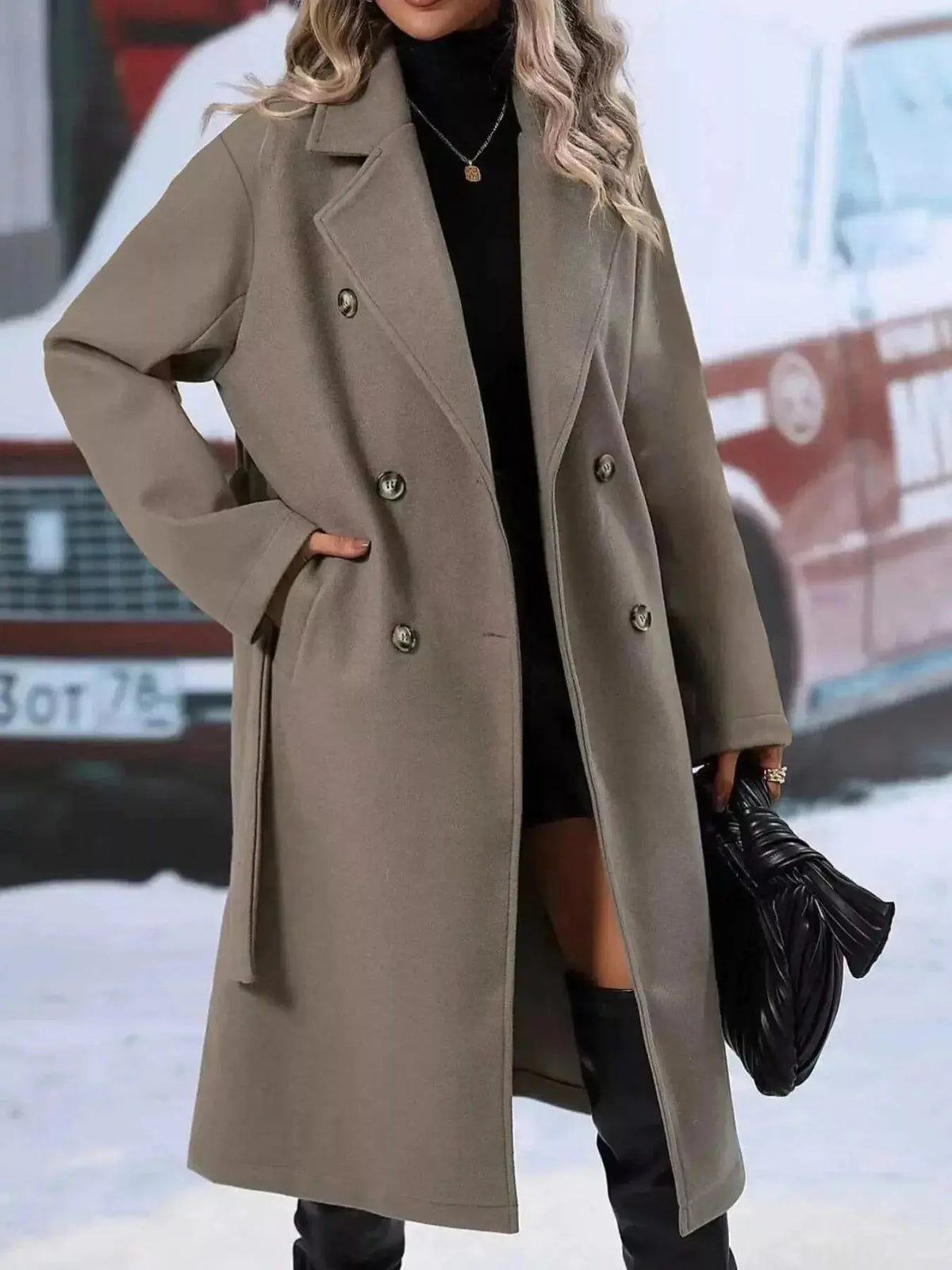 Women’s double-breasted trench coat with tie waist belt by Plush Fashion Hub, shown hanging with classic beige fabric and stylish design.