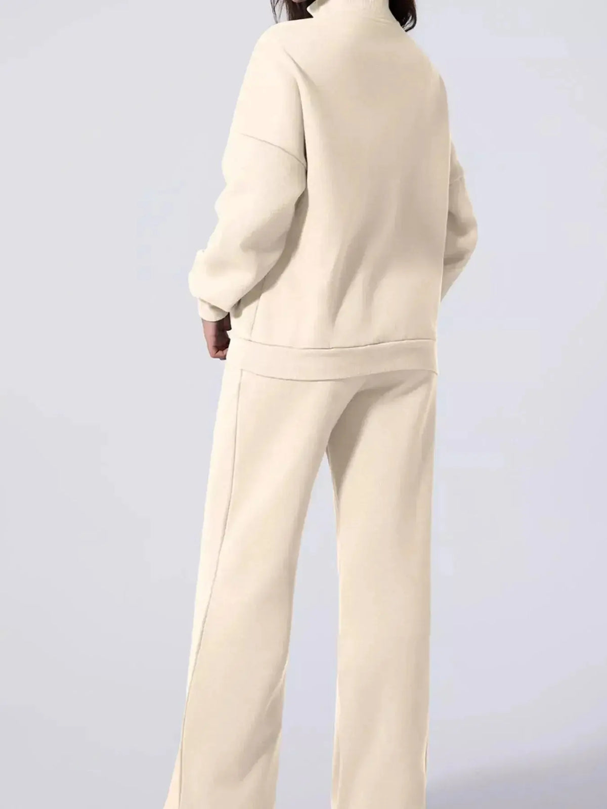Women’s drop shoulder zip-up jacket and jogger two-piece lounge set, soft sweat suit by Plush Fashion Hub, casual and comfortable.