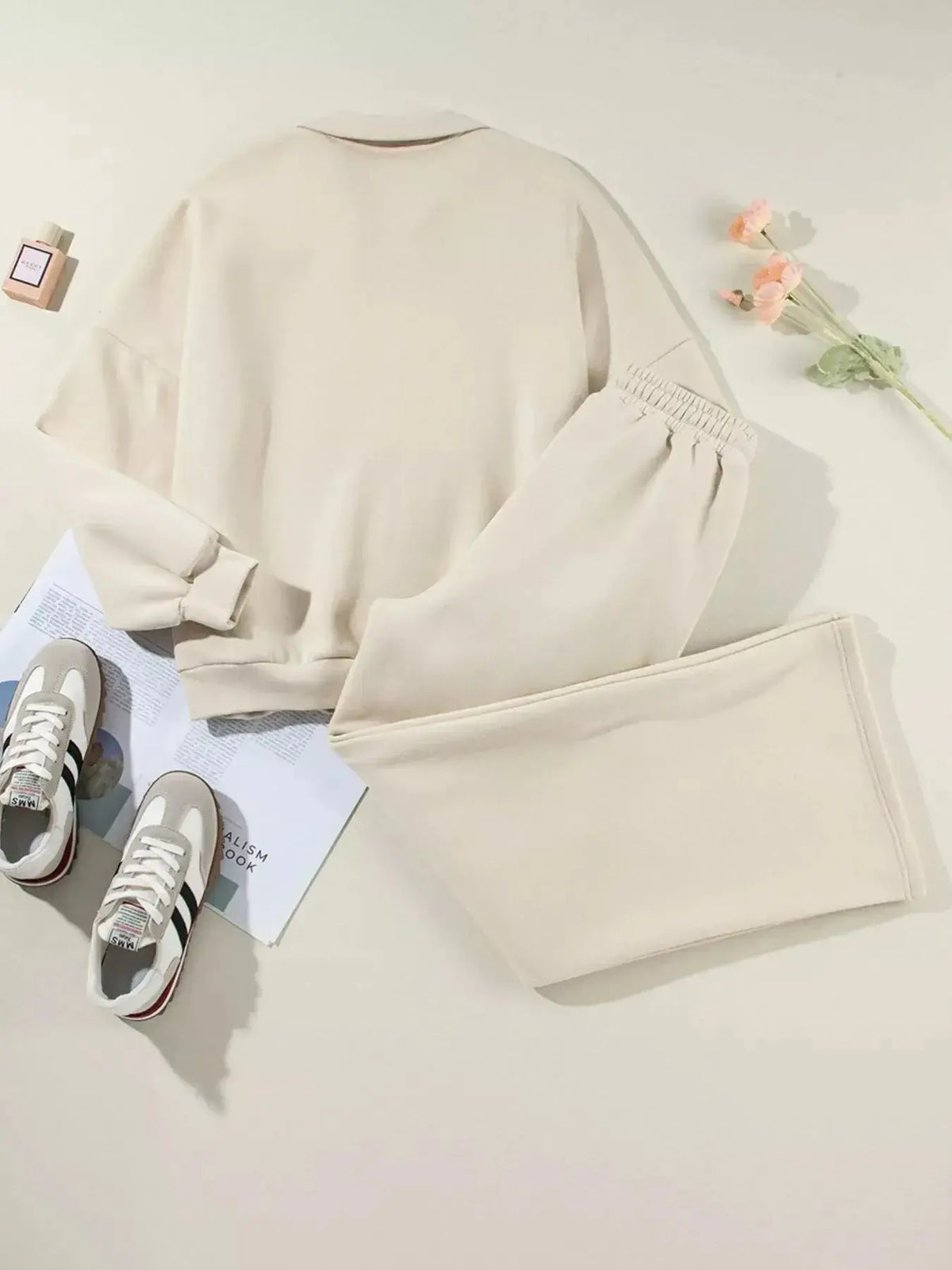 Women’s drop shoulder zip-up jacket and jogger lounge set by Plush Fashion Hub, featuring a cozy sweat suit in relaxed style.