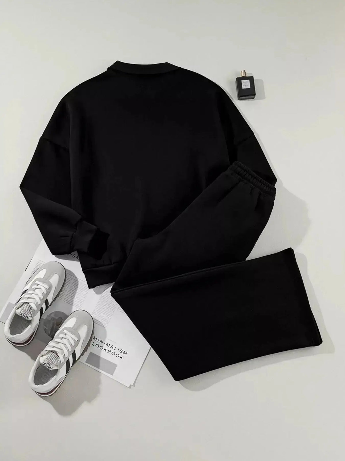 Women’s drop shoulder zip-up jacket and jogger lounge set from Plush Fashion Hub, cozy two-piece sweat suit for casual wear.