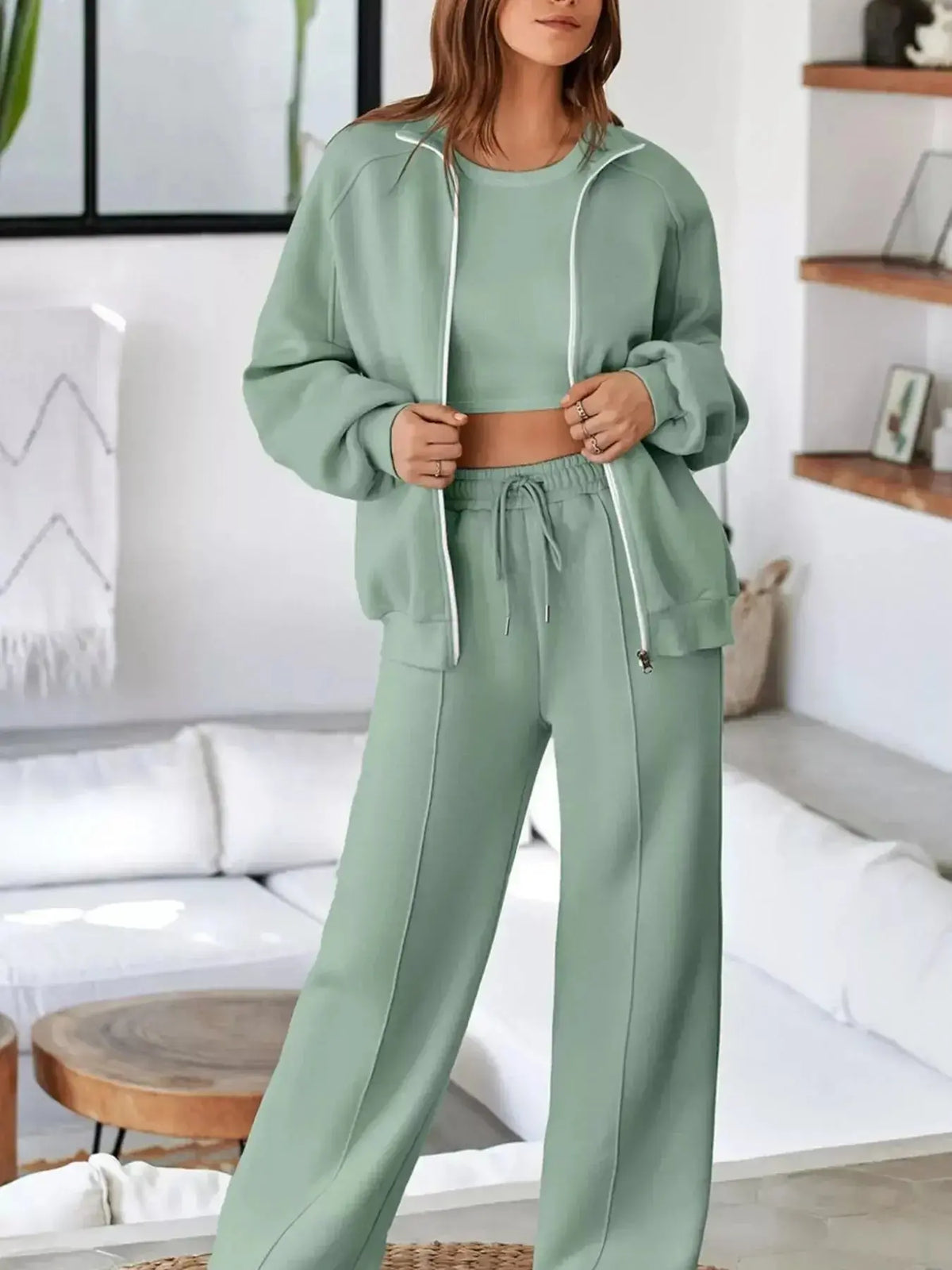 Women's drop shoulder zip-up jacket and matching jogger lounge set by Plush Fashion Hub, casual and comfortable two-piece sweat suit.