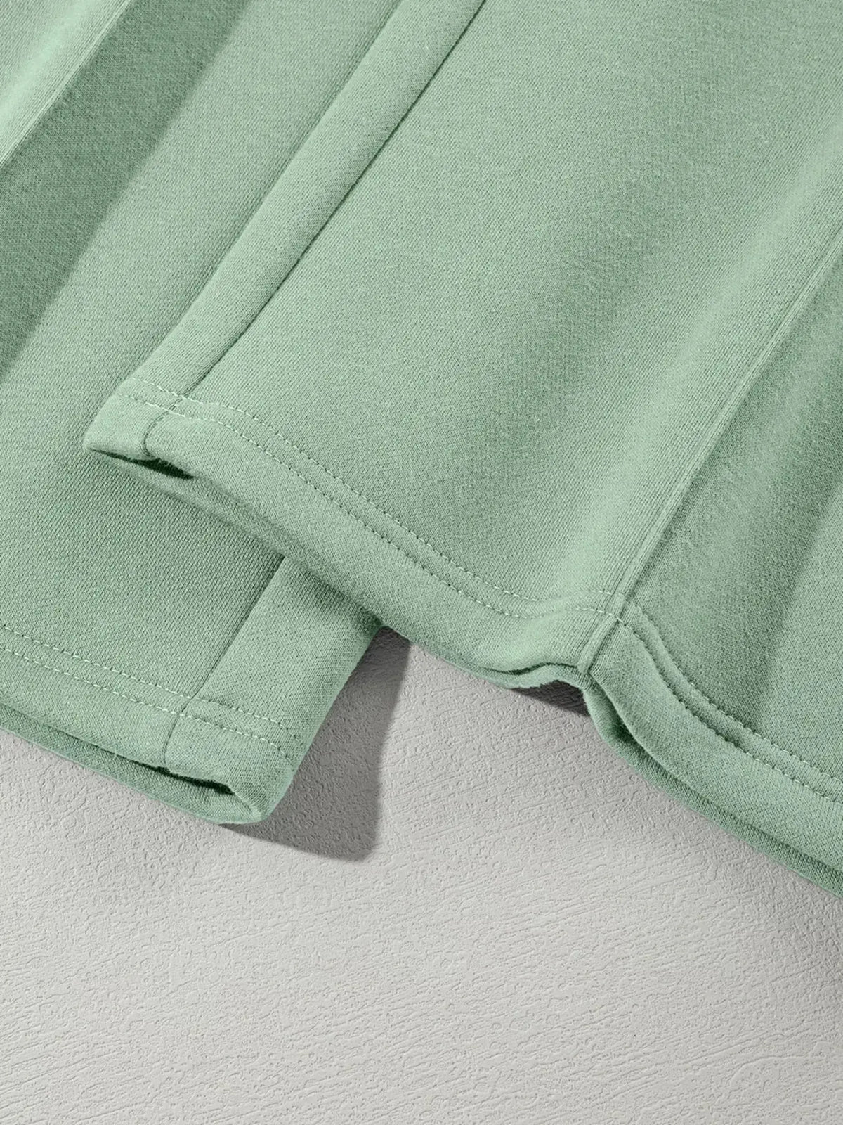 Women's drop shoulder zip-up jacket and jogger lounge set by Plush Fashion Hub, featuring a comfortable sweat suit for casual wear.