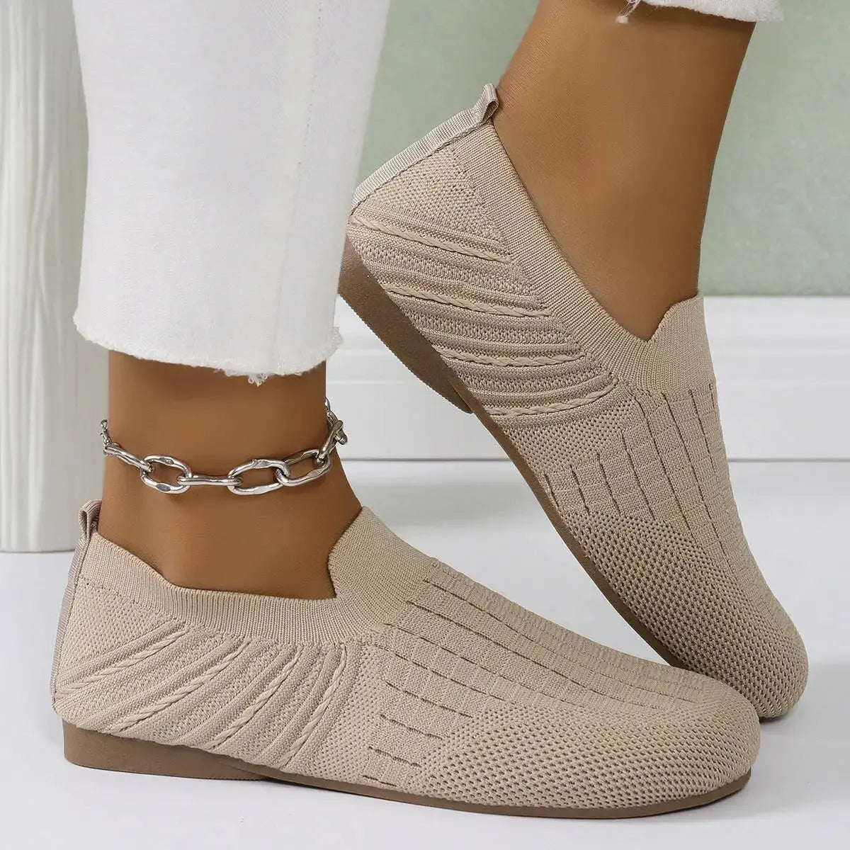 Women’s breathable mesh casual flats in a solid color, lightweight walking shoes by Plush Fashion Hub.