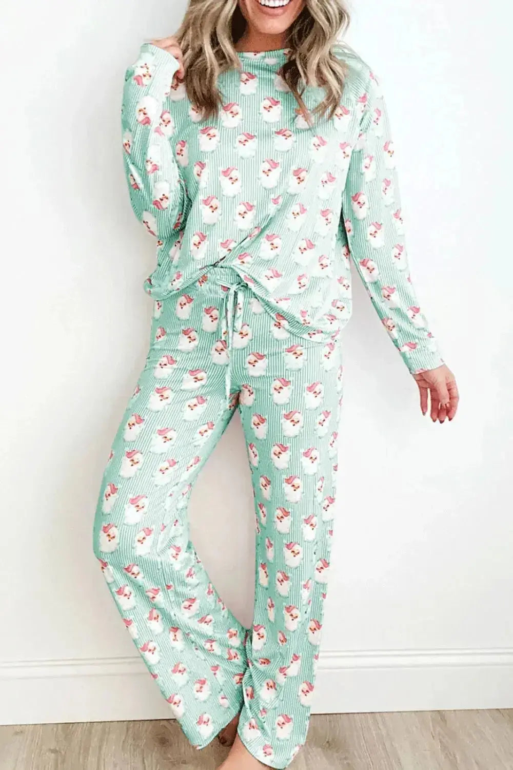 Women’s festive Santa print long sleeve pajamas lounge set by Plush Fashion Hub, featuring cozy holiday-themed sleepwear.