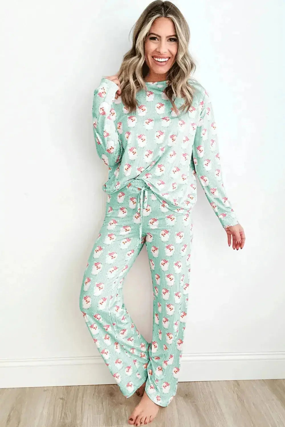 Women’s festive Santa print long sleeve pajamas lounge set by Plush Fashion Hub, featuring cozy holiday-themed sleepwear.
