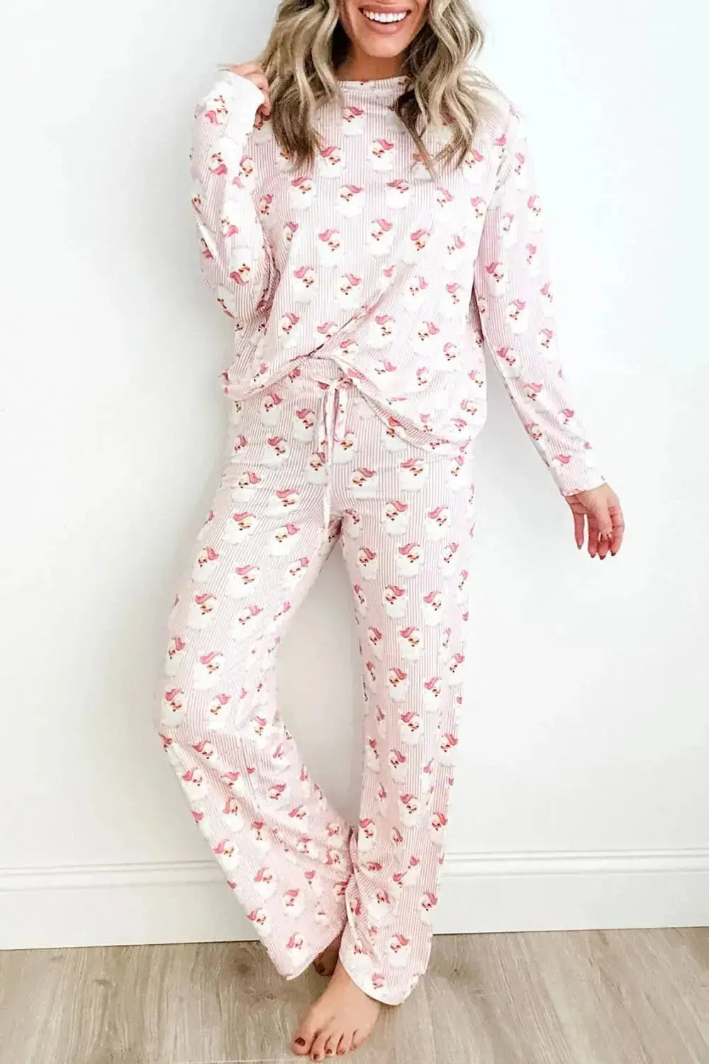 Women’s festive Santa print long sleeve pajama lounge set by Plush Fashion Hub, featuring holiday-themed Christmas pajamas for women.