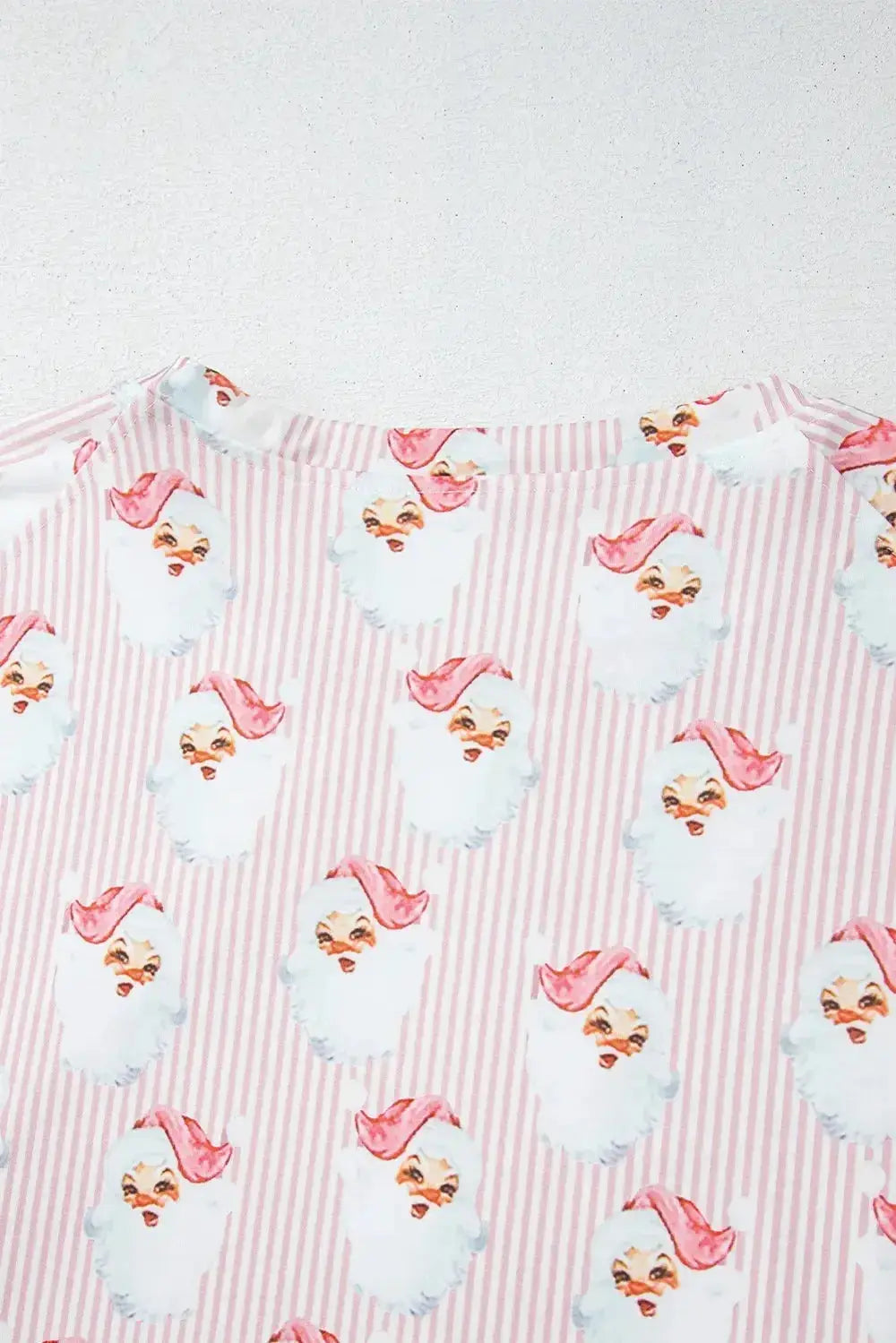 Women’s festive Santa print long sleeve pajama lounge set by Plush Fashion Hub, featuring cozy holiday pajama pajamas.