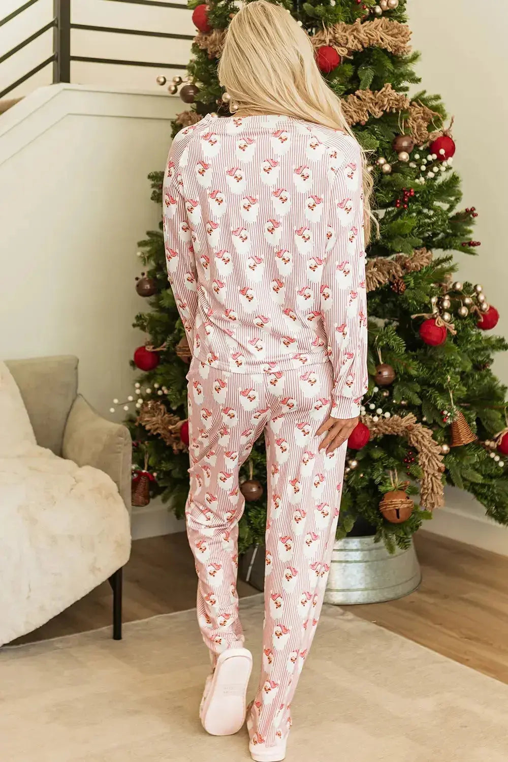 Women’s festive Santa print long sleeve pajama lounge set by Plush Fashion Hub, featuring cozy holiday-themed pajamas with festive Santa design.