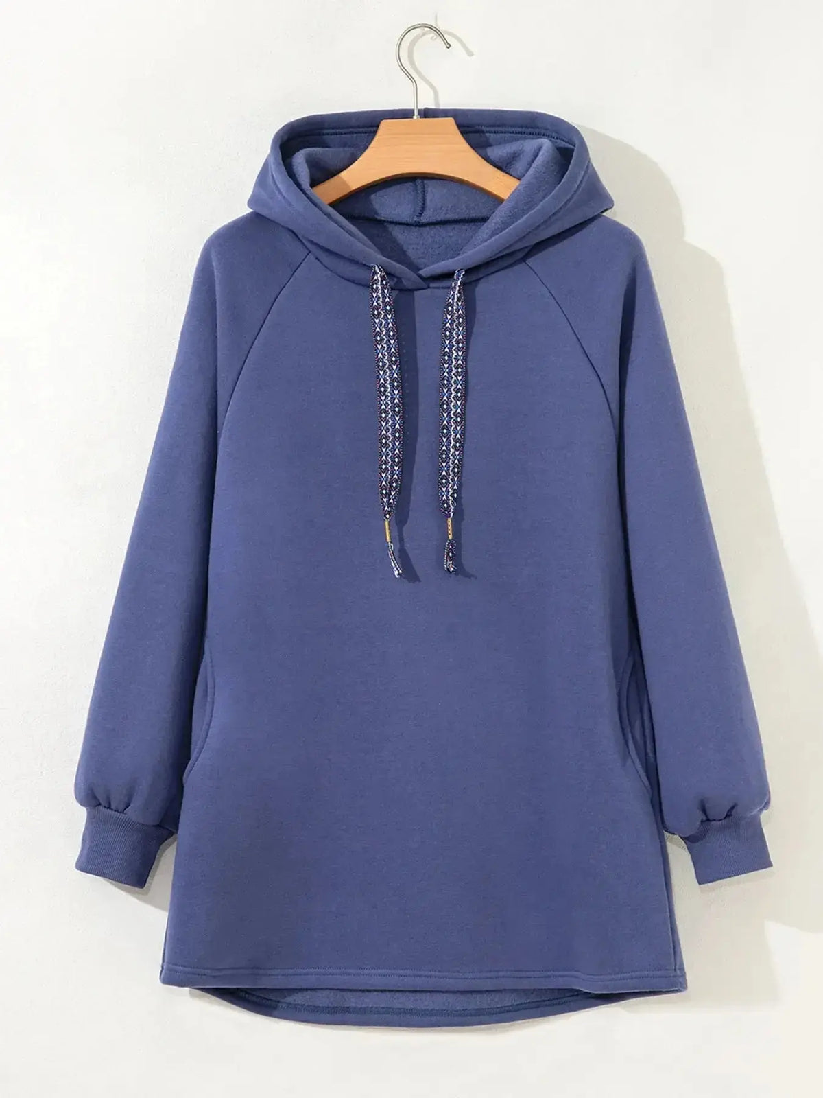 Women’s fleece-lined oversized tunic hoodie with drawstring, plush fashion hoodie for casual comfort and cozy style.