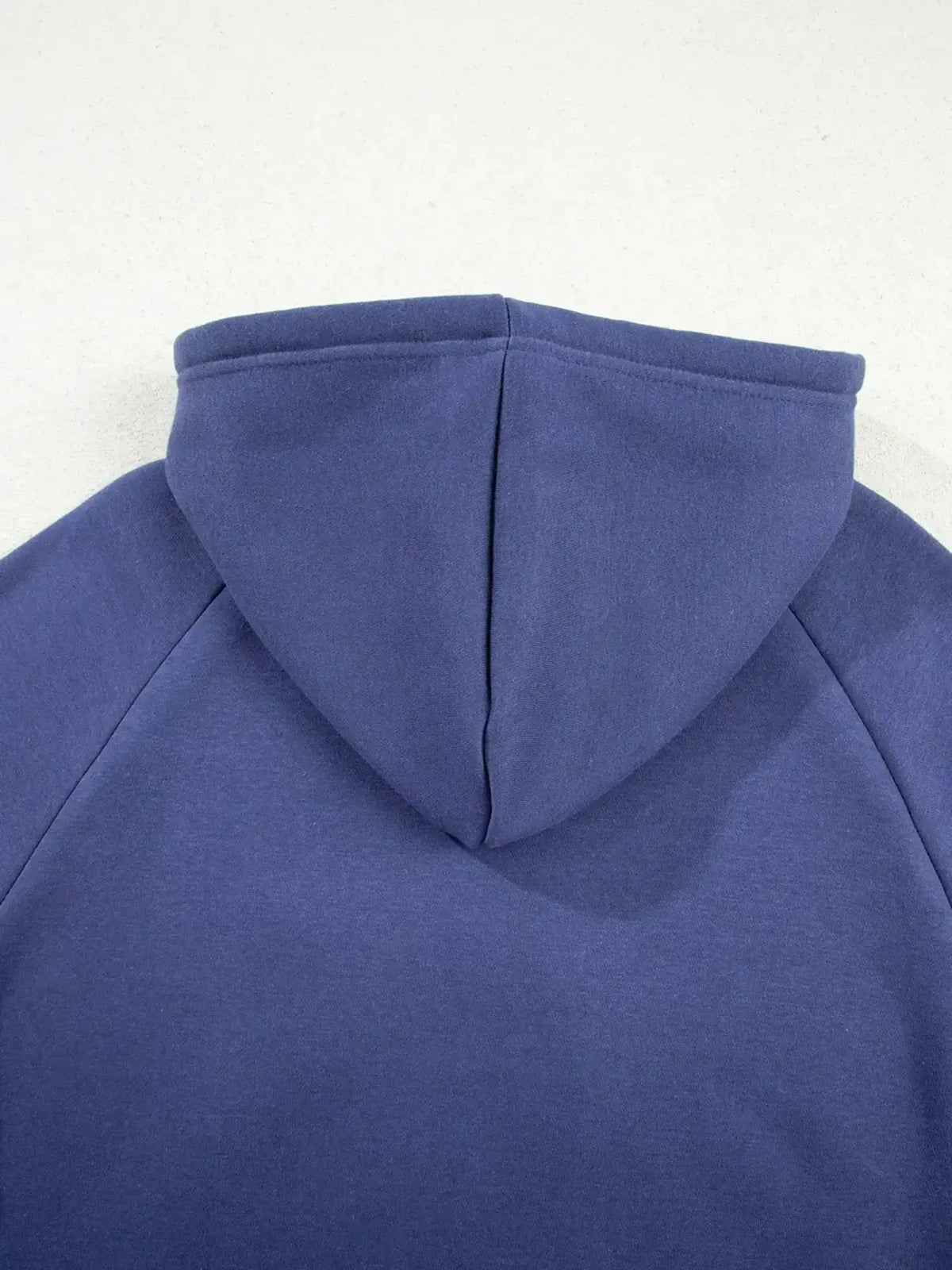 Women’s fleece-lined oversized tunic hoodie with drawstring from Plush Fashion Hub, featuring a cozy, relaxed fit and hood.