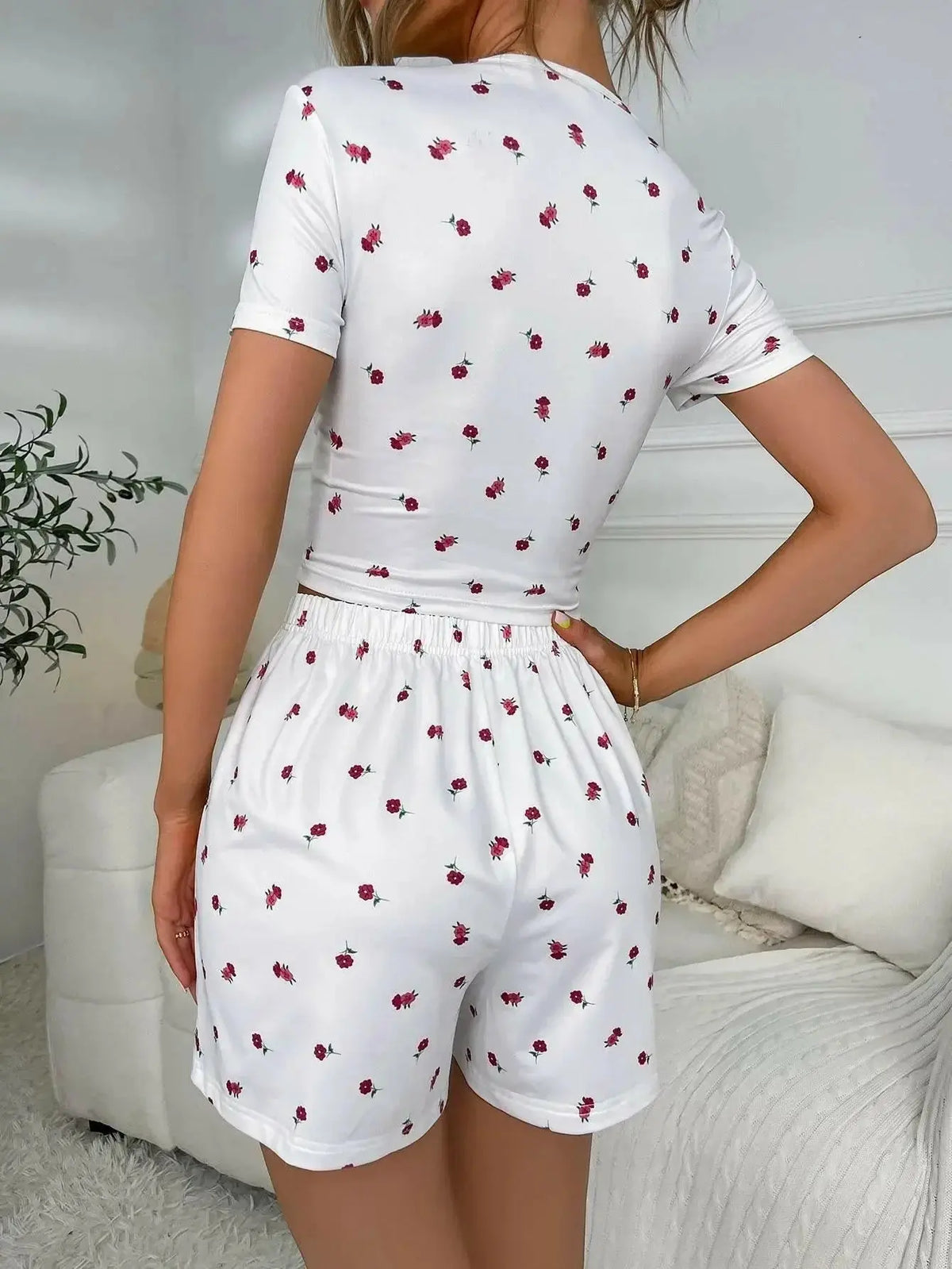 Women’s floral ruched lounge set with lightweight V-neck top and matching shorts from Plush Fashion Hub.
