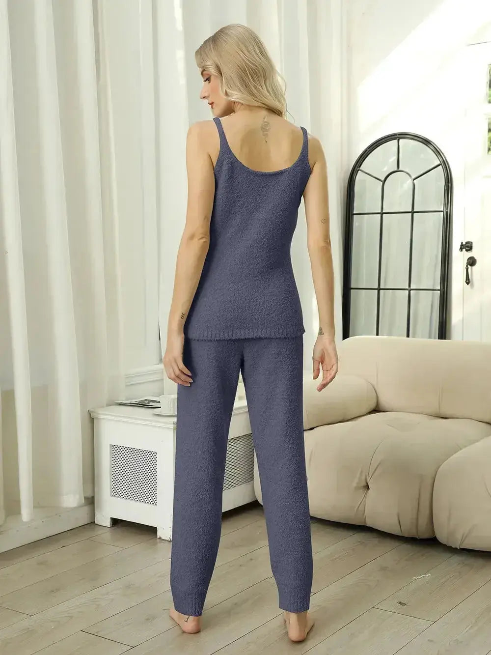 Women’s fuzzy V-neck cami and pants two-piece lounge sleepwear set, cozy pajamas by Trendsi, featuring soft fabric and relaxed fit.