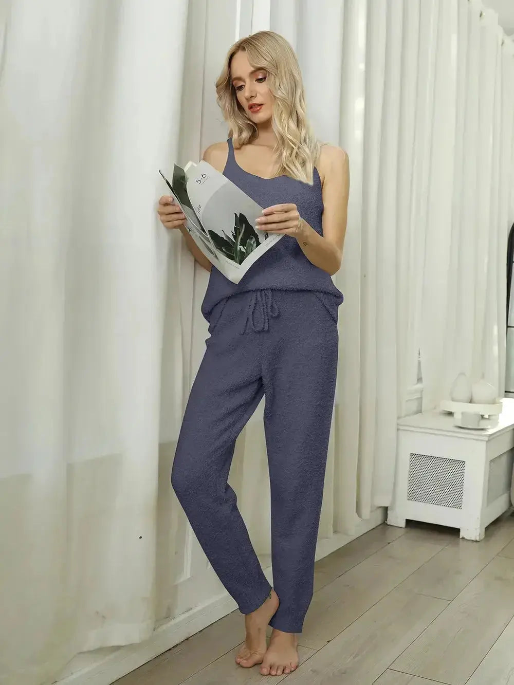 Women’s fuzzy V-neck cami and pants two-piece lounge sleepwear set, cozy pajamas with soft fabric and relaxed fit.
