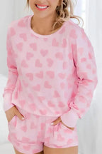 Women's heart print long sleeve pajama set by Trendsi featuring a cozy two-piece plush lounge and sleepwear ensemble.