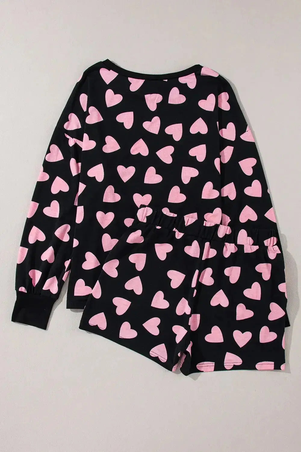 Women’s heart print long sleeve pajama set featuring a cozy two-piece plush lounge set by Trendsi.