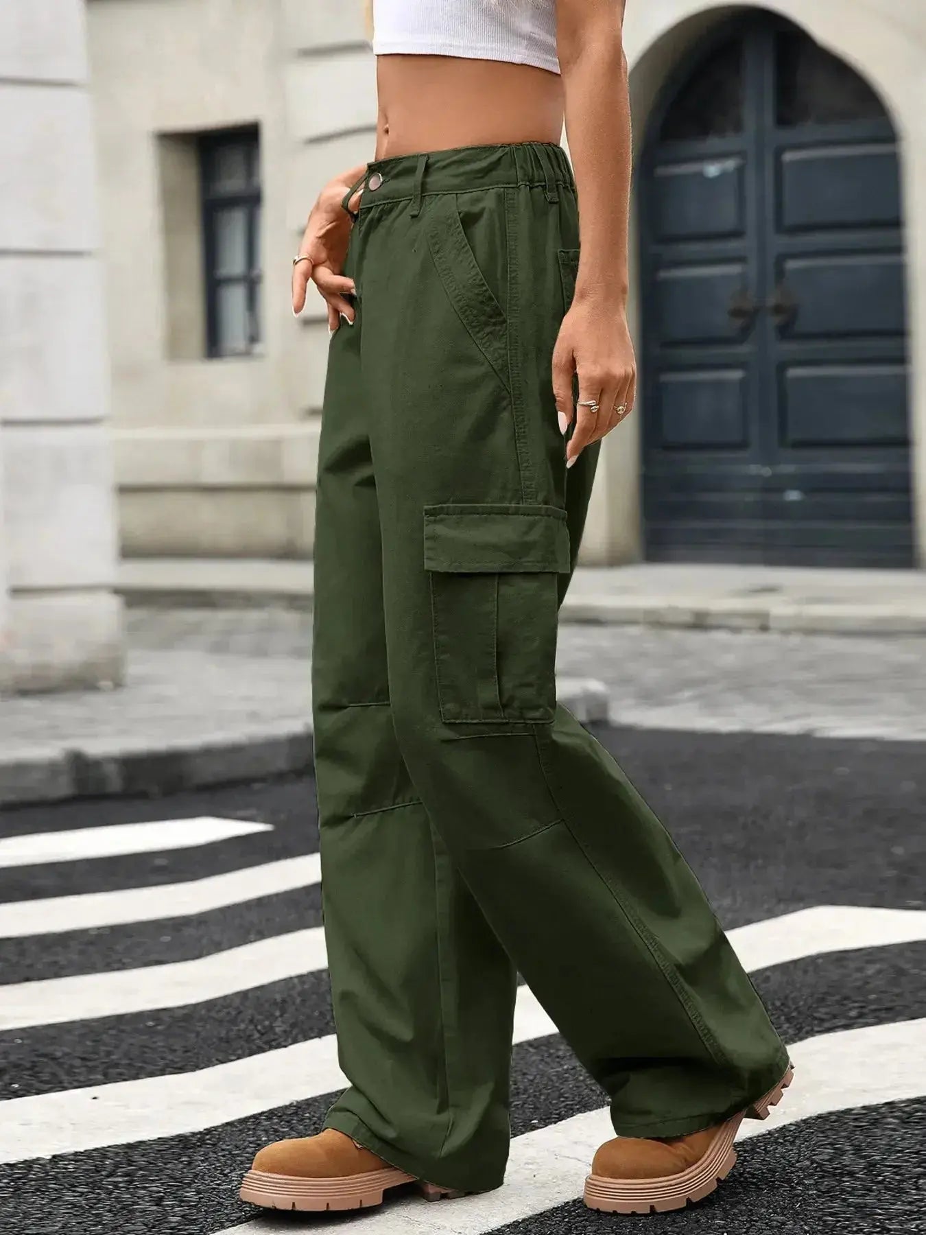 Women’s high-rise wide-leg cargo jeans by Trendsi featuring utility denim style with multiple side pockets and relaxed fit.