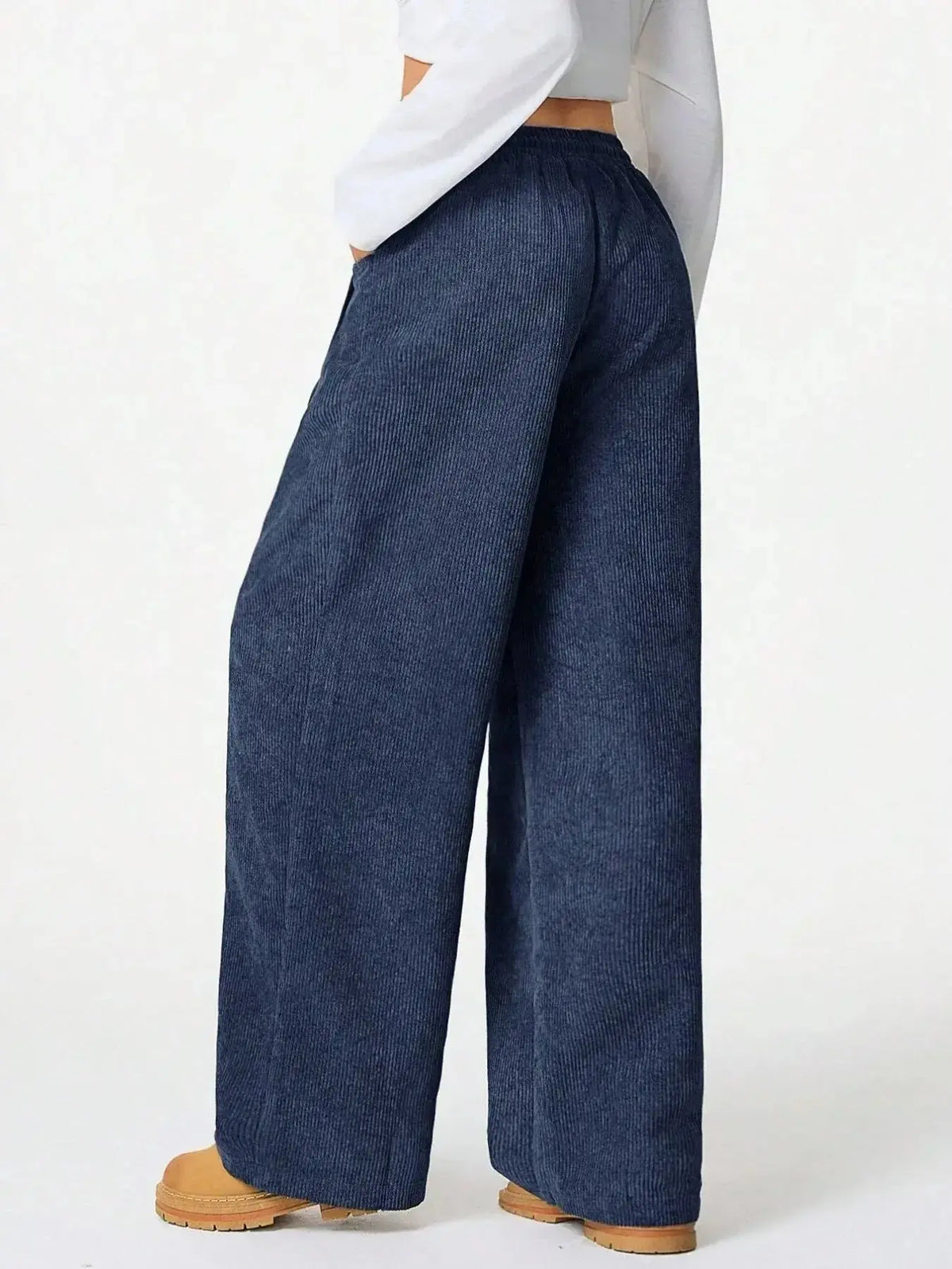 Women’s high-waisted wide-leg lounge pants with drawstring waist, casual and comfortable wear from Plush Fashion Hub.
