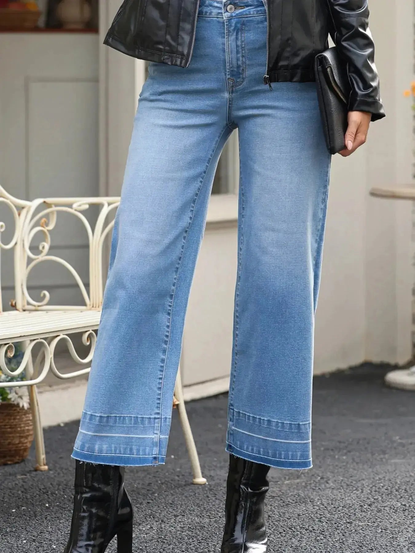 Women’s high-waisted wide-leg washed denim jeans with a classic relaxed fit, featuring a stylish casual look.