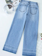 Women’s high-waisted wide-leg washed denim jeans with a classic relaxed fit, showing the stylish denim fabric and relaxed silhouette.