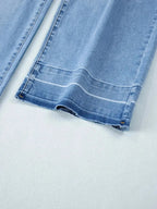 Women’s high-waisted wide-leg washed denim jeans with a relaxed fit, showcasing the trendy Trendsi denim style.