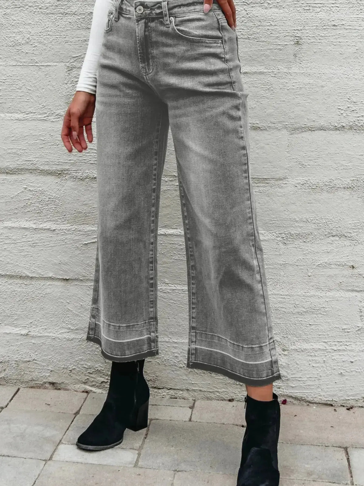 Women’s high-waisted wide-leg washed denim jeans with a relaxed fit, featuring classic style and comfortable fit by Plush Fashion Hub.