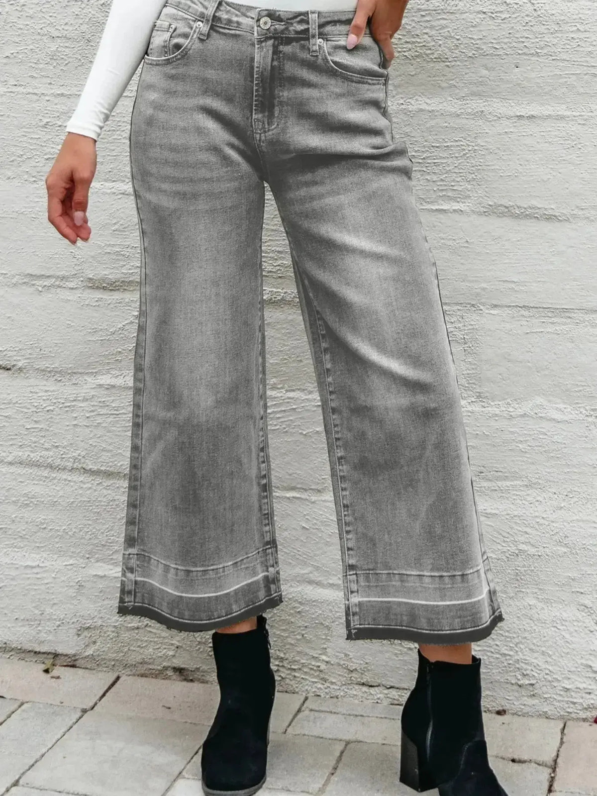Women’s high-waisted wide-leg washed denim jeans by Plush Fashion Hub, featuring a relaxed fit and classic denim style.