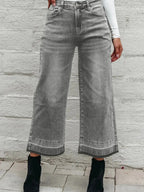 Women’s high-waisted wide-leg washed denim jeans with a relaxed fit, showcasing trendy Trendsi jeans on a model.