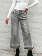 Women's high-waisted wide-leg washed denim jeans with a relaxed fit, featuring classic styling and trendy denim texture.