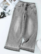 Women's high-waisted wide-leg washed denim jeans with a relaxed fit, featuring classic denim texture and trendy style.