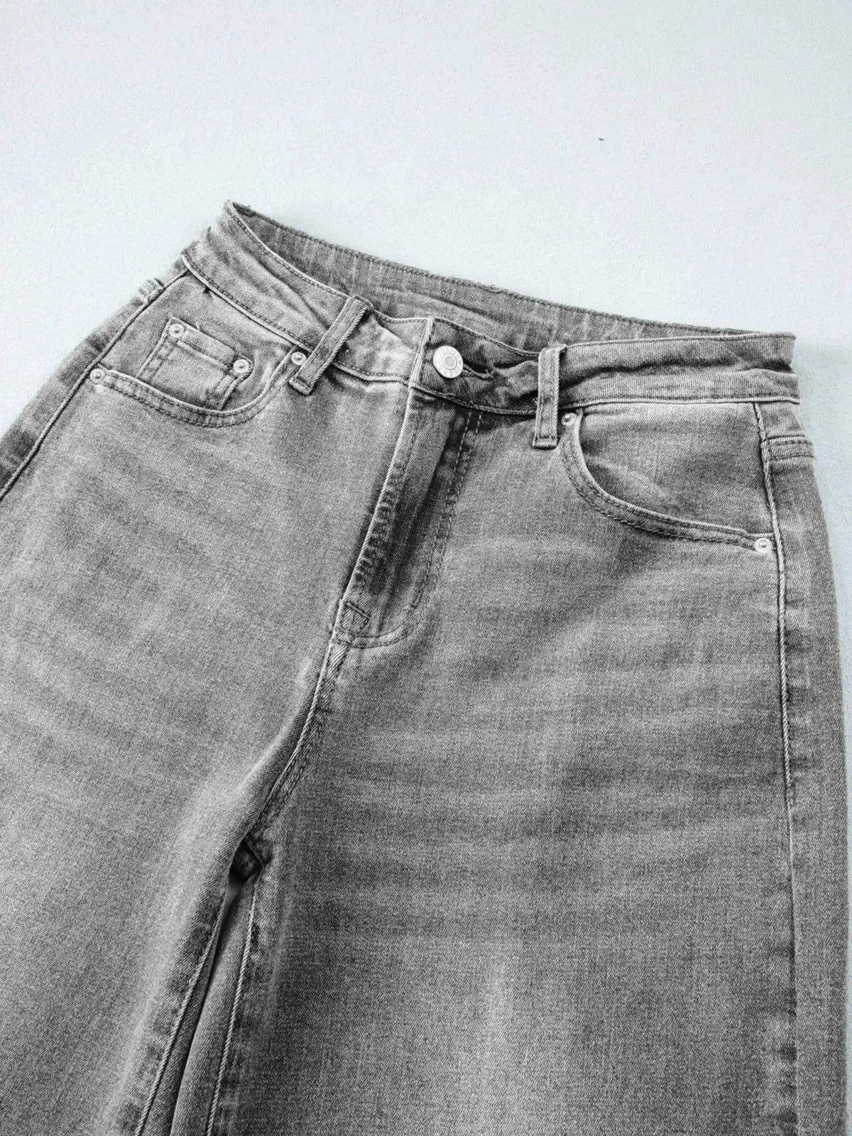 Women’s high-waisted wide-leg washed denim jeans by Plush Fashion Hub, featuring a relaxed fit and classic style.