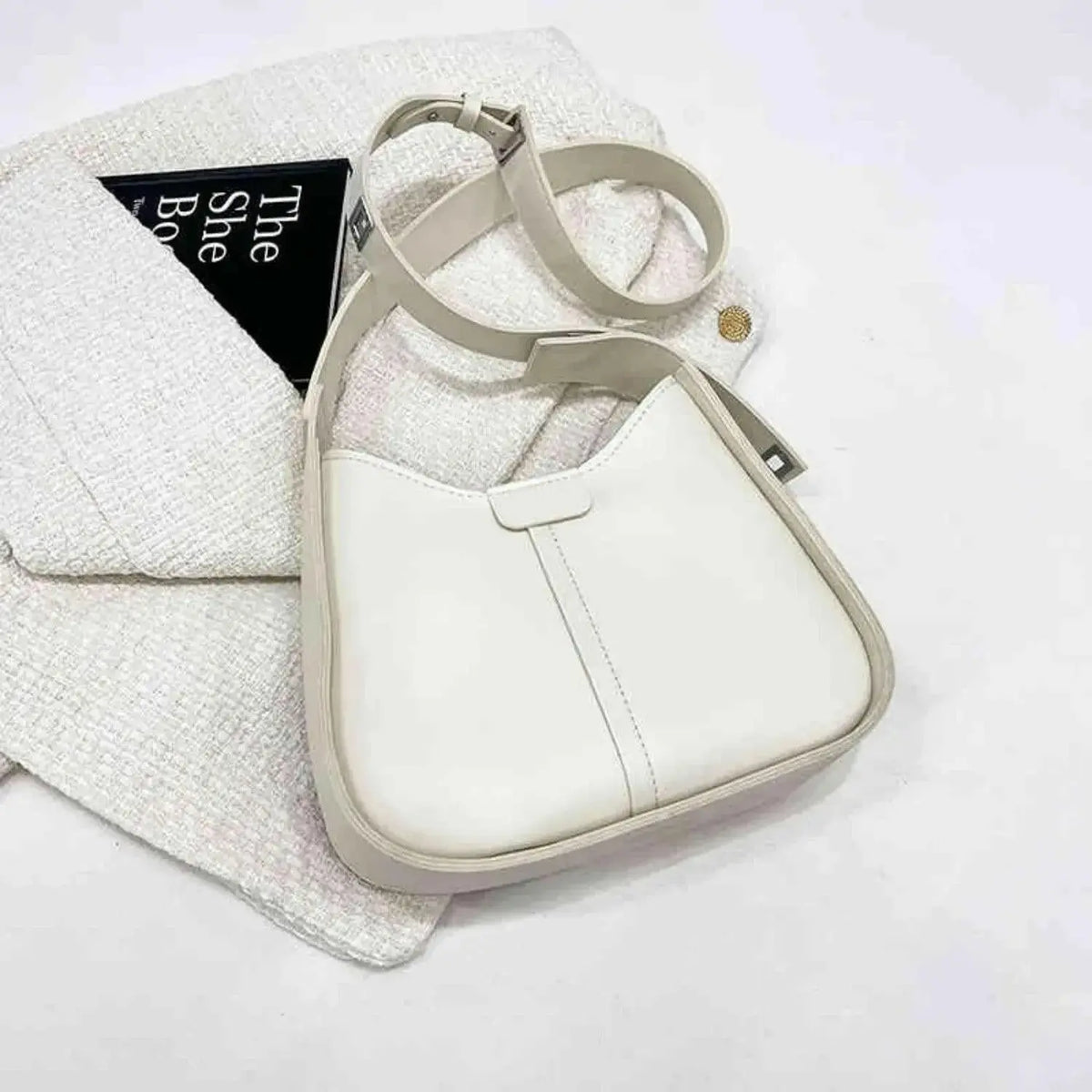 Women textured vegan leather crossbody handbag with versatile shoulder strap, stylish plush fashion purse.